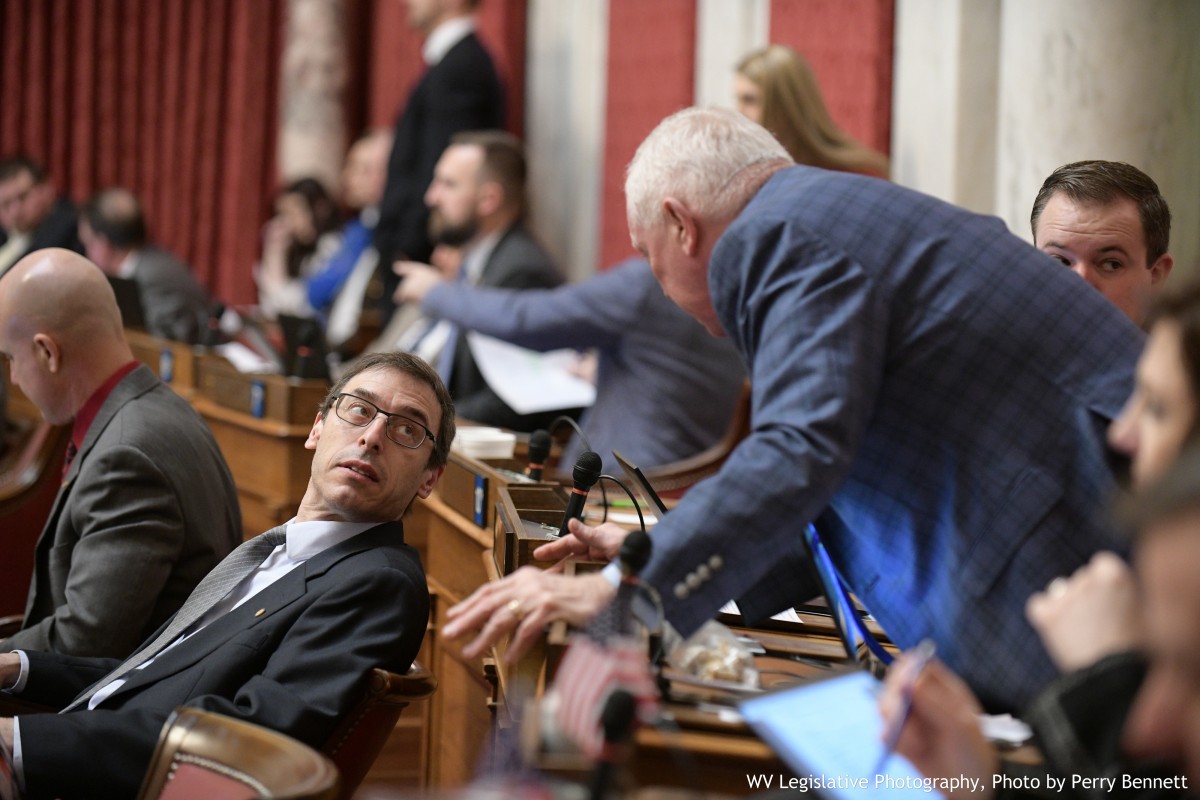 House debates abandoned savings bond bill at length; passes sex offender bill in seconds